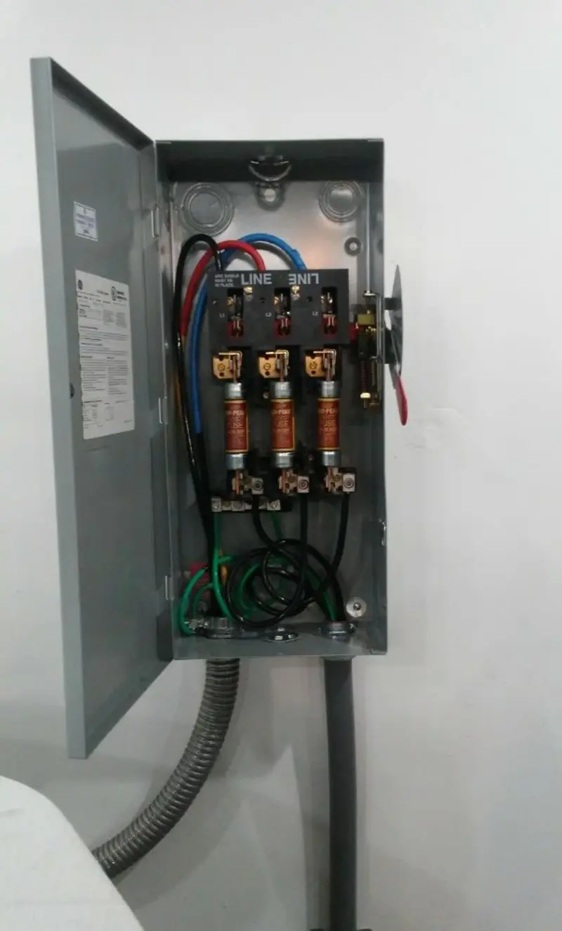 Three-phase disconnect switch installed for Smoke Detector Installation in Martin